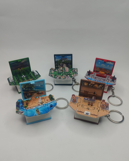 📚 ✨Llaveros Libro 3D – Mini Escenarios Sorpresa